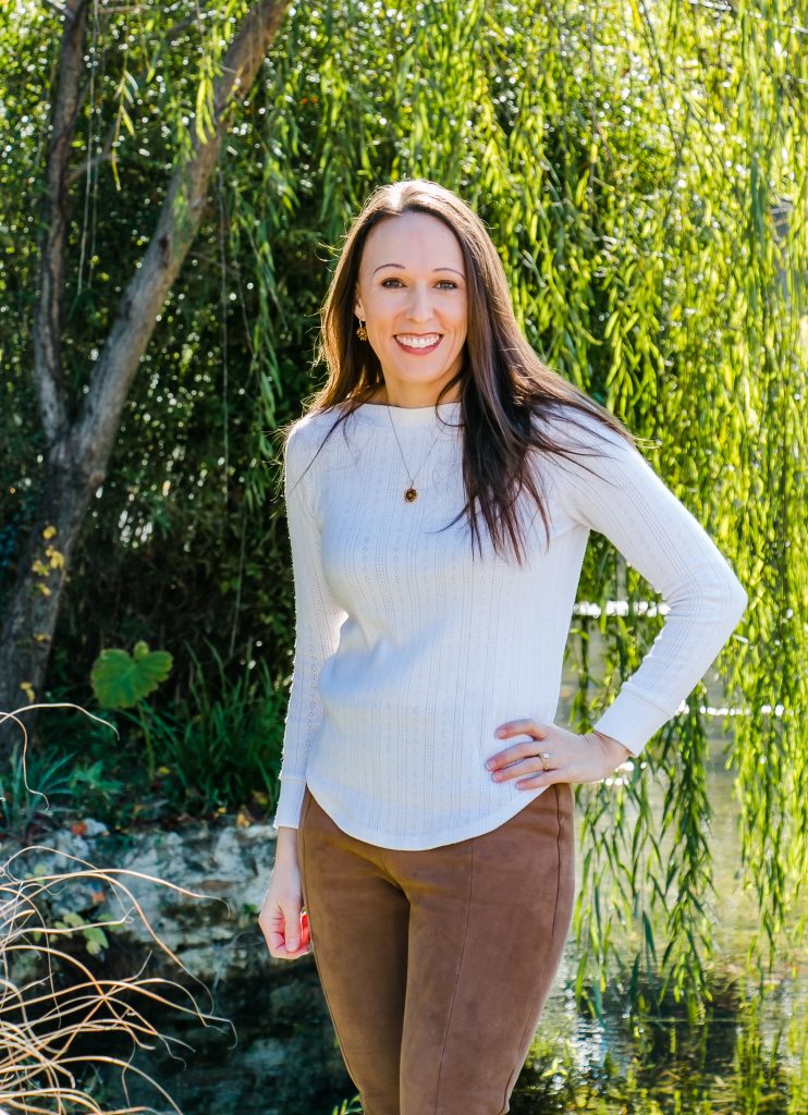 Kelli smiling, representing intentional eating and balanced living